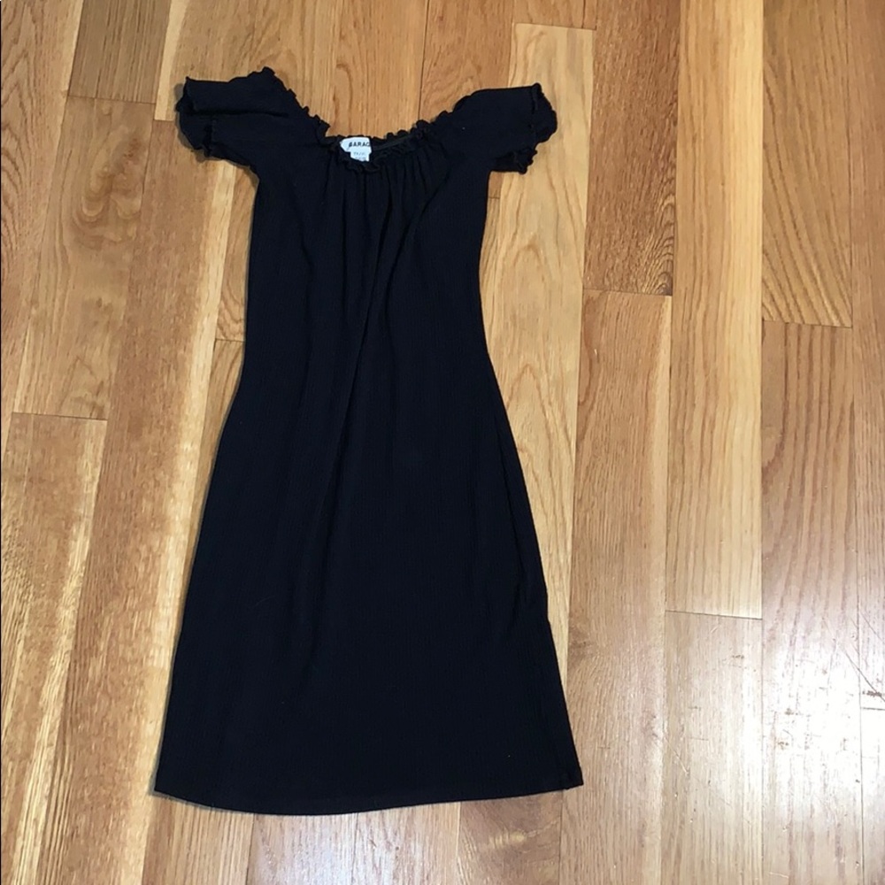Tight black ribbed off the shoulder dress